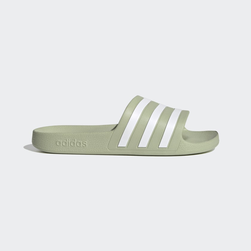 Green adilette slides store