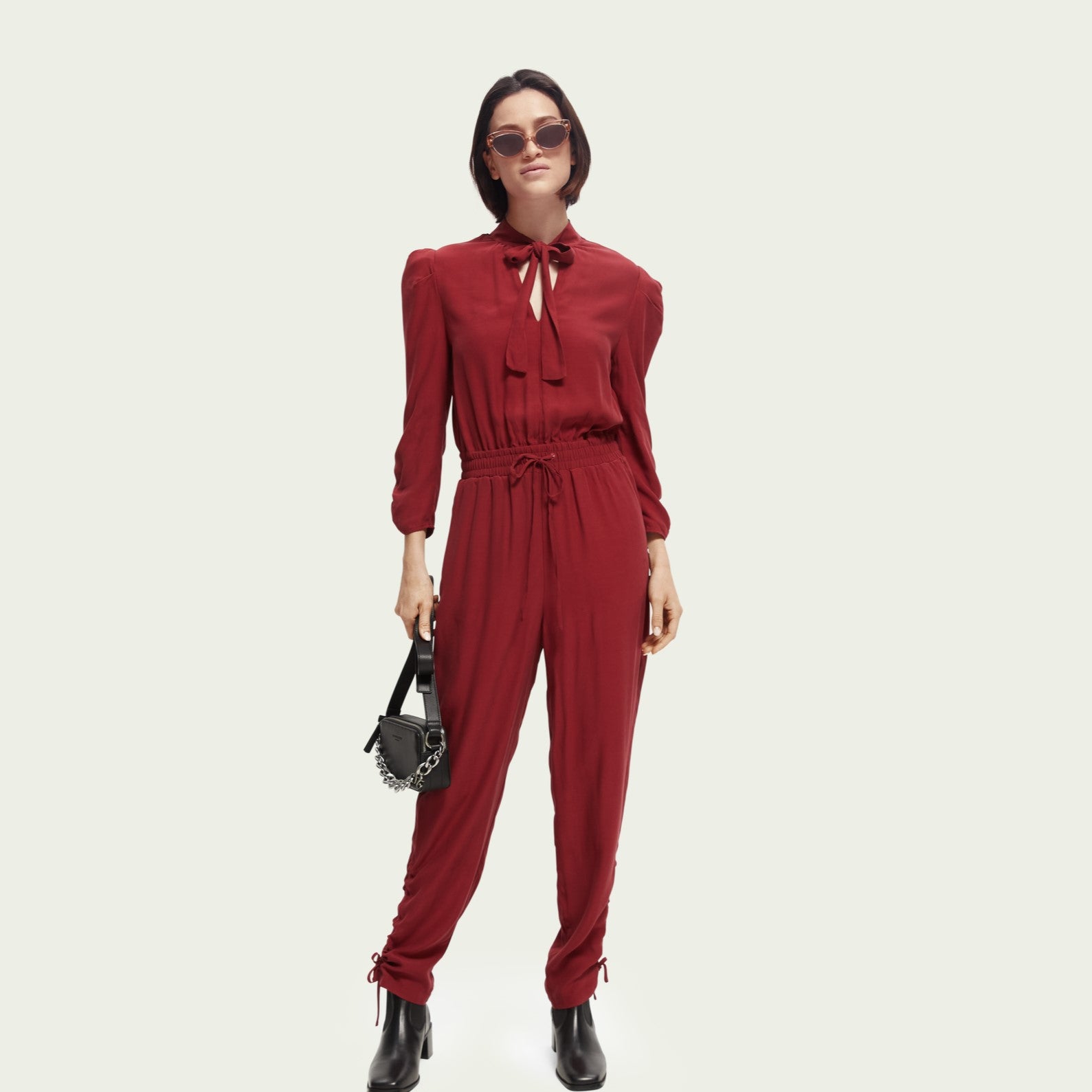 https://www.goodnbr.com/cdn/shop/products/JumpsuitwithGatheredDetails_Red.jpg?v=1667572572